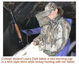 young hunter asleep in a blind while turkey hunting