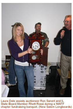 Laura Dale assists auctioneer Ron Sanert and IL  State Board Member Rhett Rossi during a NWTF chapter fundraising banquet.New Salem Longbeards Chapter